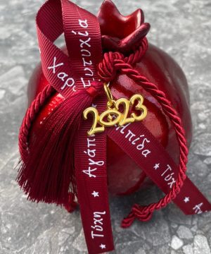 Ρόδι κεραμικό μπορντό με φούντα , κορδέλες και μεταλλικό στοιχείο με χρονολογία